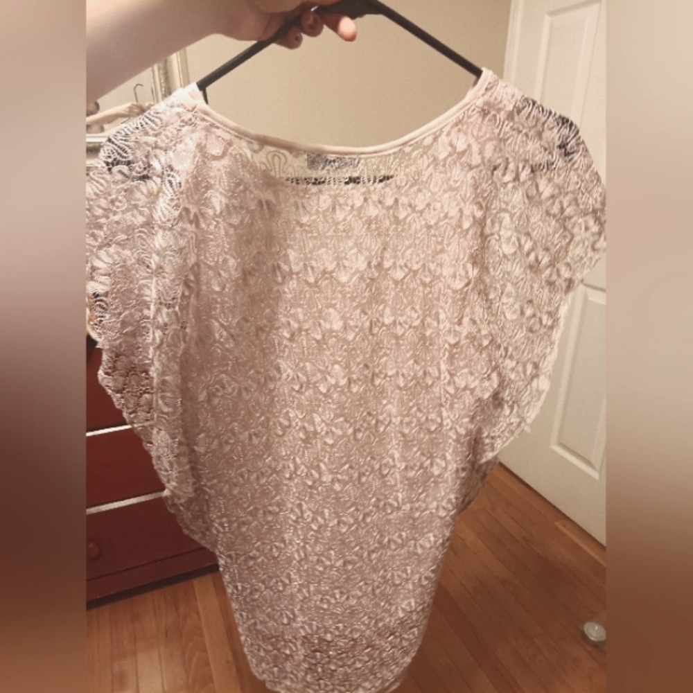 A pink lace blouse